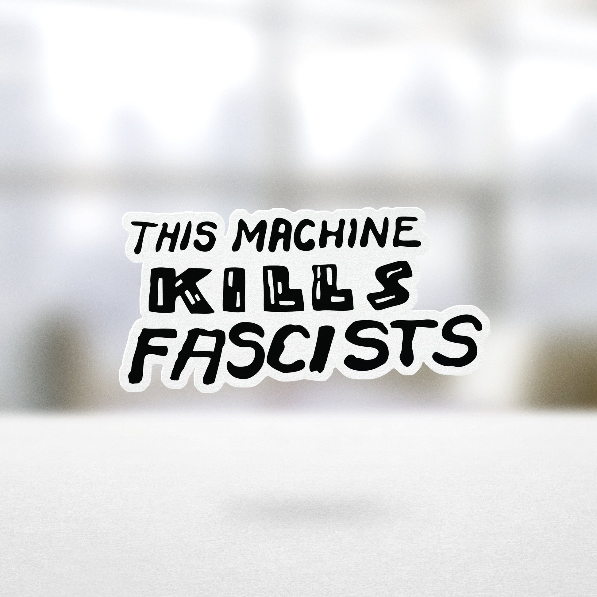 This Machine Kills Fascists Sticker